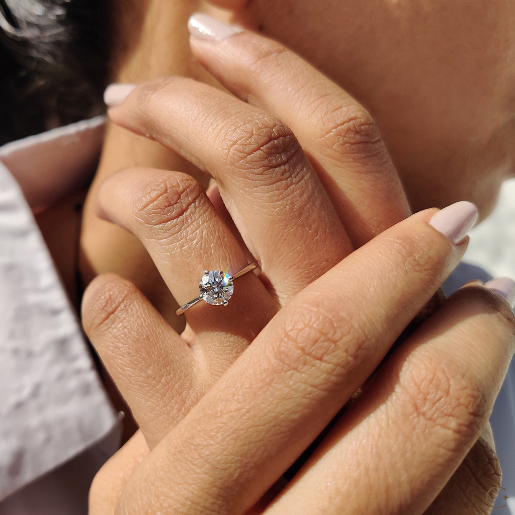Round Solitaire Engagement Ring With Tapered Shank Design