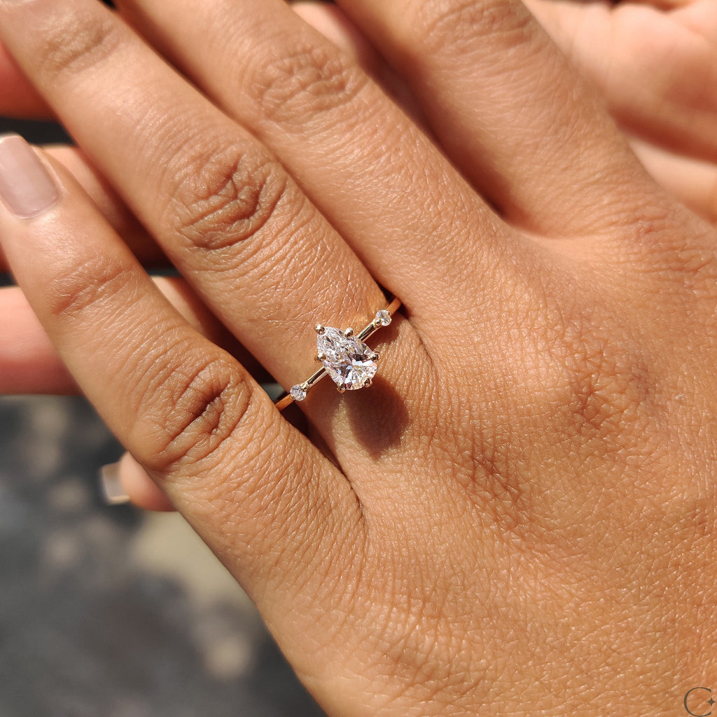 Pear Cut Diamond Ring With Distance Pave Setting