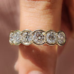 Round Diamond Wedding Band In Half Bezel Setting