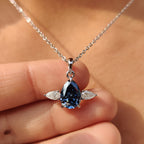 Three Stone Pendant With Royal Dark Blue Pear Moissanite