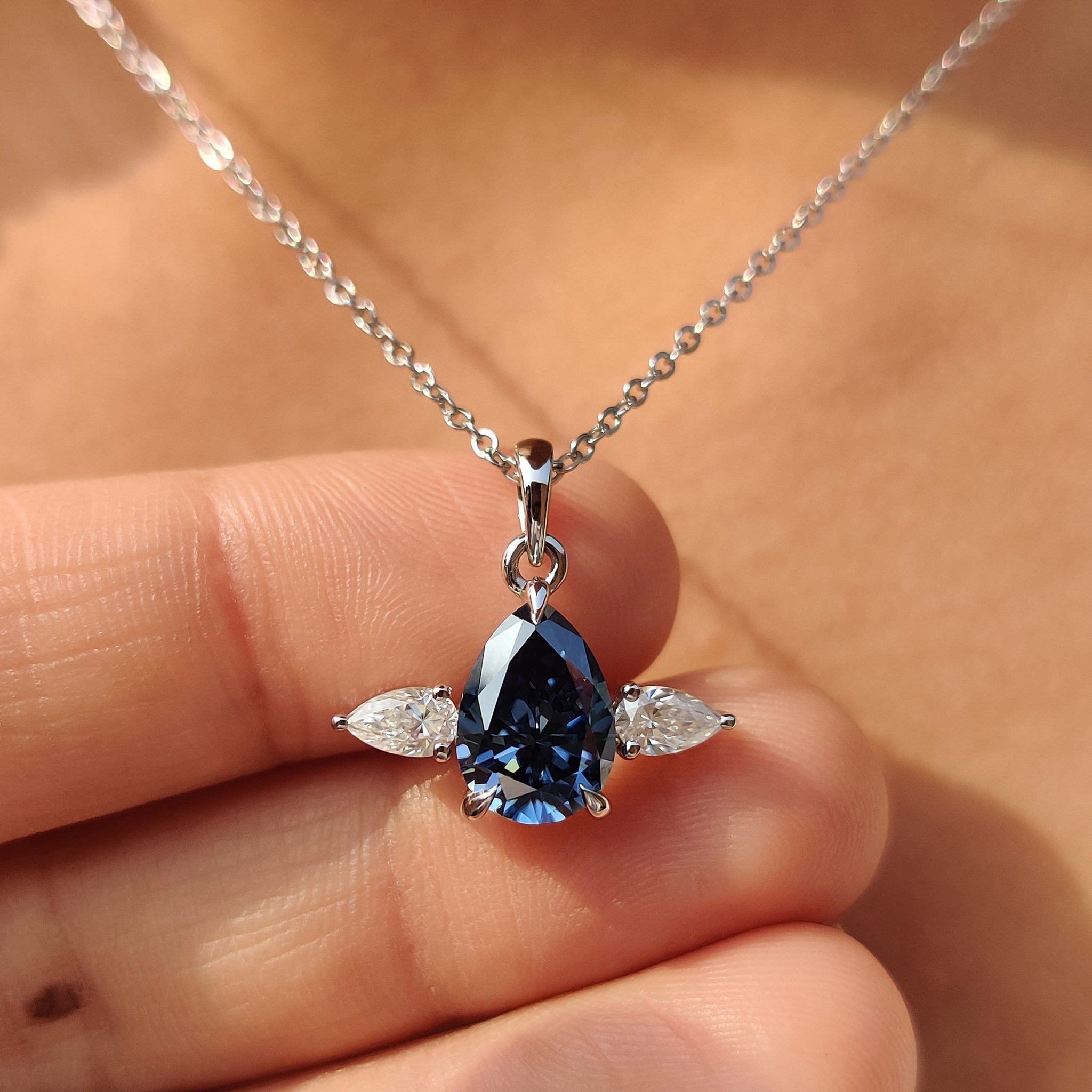 Three Stone Pendant With Royal Dark Blue Pear Moissanite