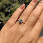 Oval Halo Engagement Ring In Cathedral Setting