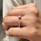 2 Stone Engagement Ring Featuring Emerald and Pear Cut