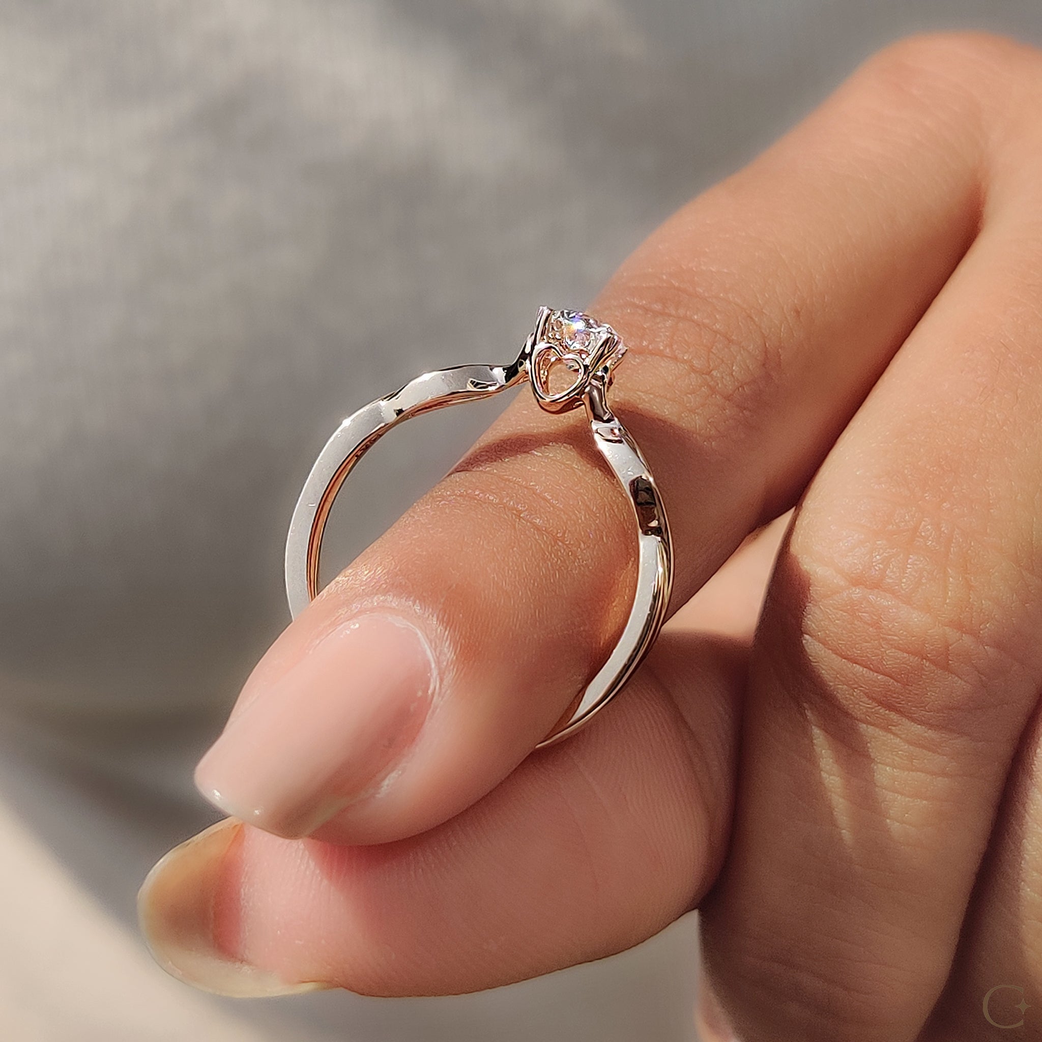 Round Solitaire Engagement Ring With Twisted Shank Band