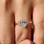 Oval Diamond Ring With Round Cut Side Stone