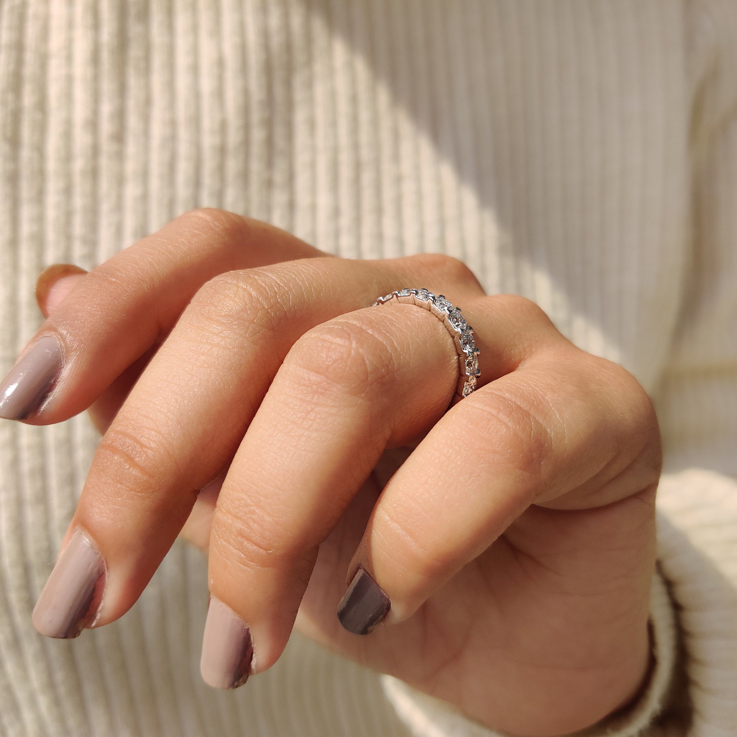 Round Cut Eternity Band In Secure Prong Setting