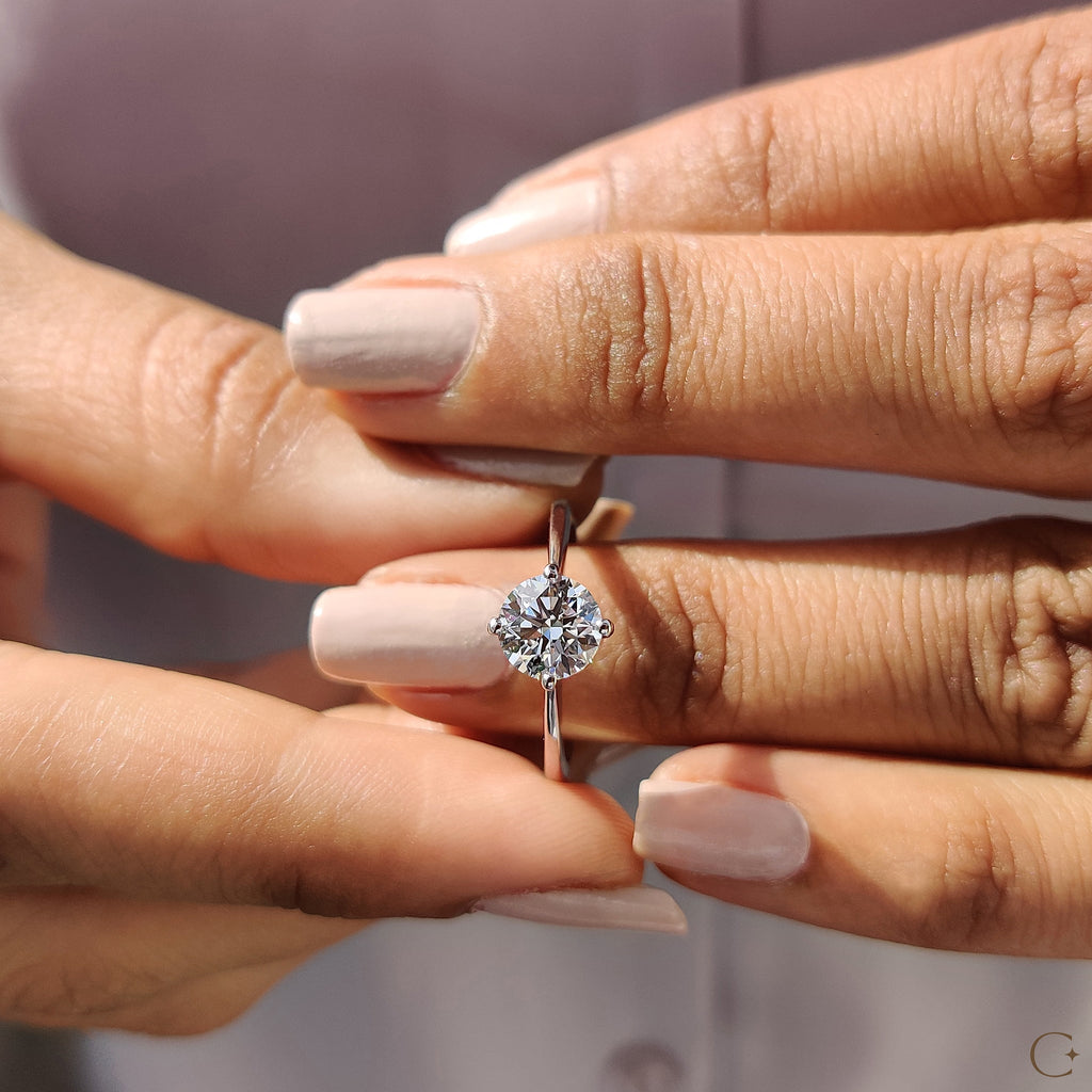 Round Solitaire Engagement Ring With Tapered Shank Design