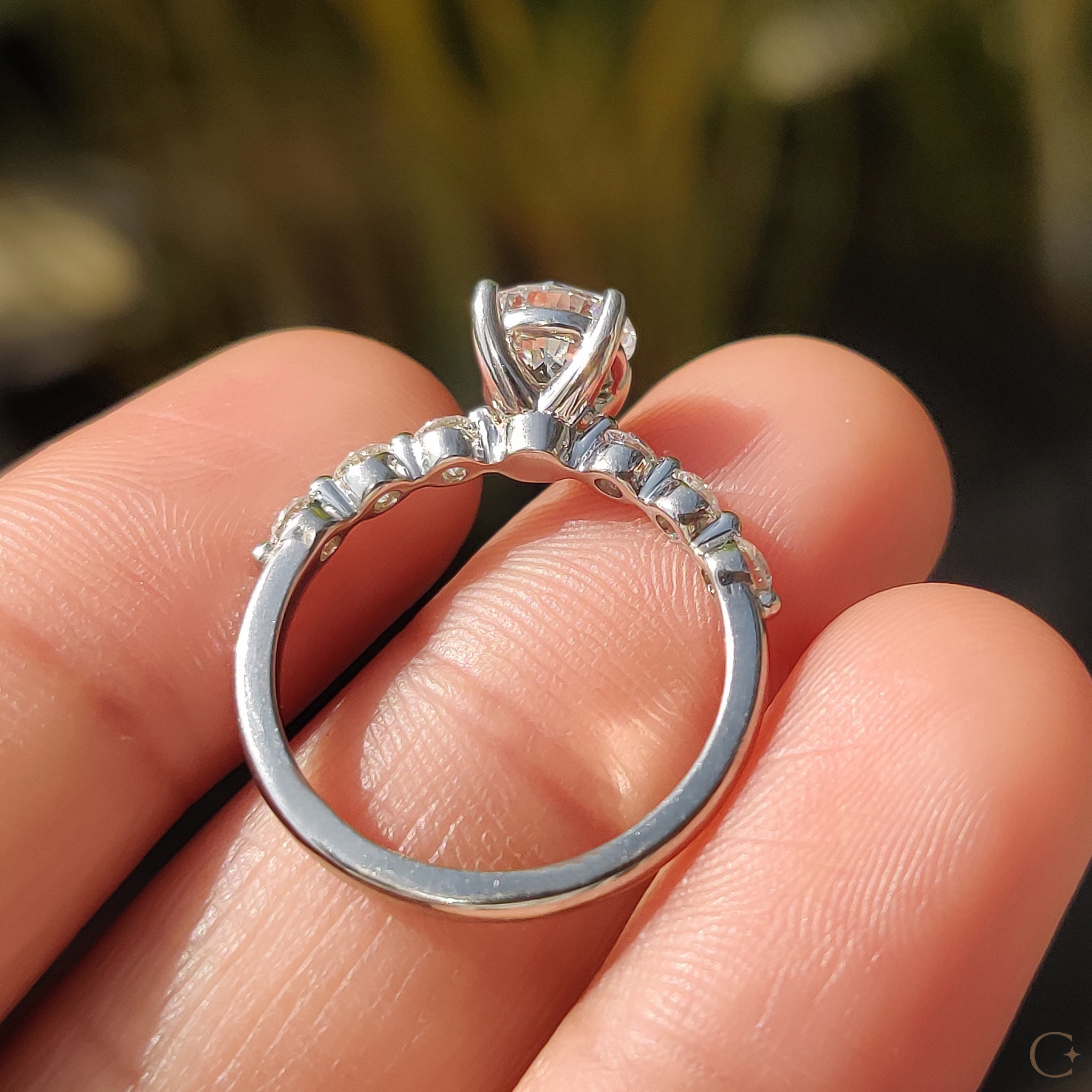 Round Brilliant Cut Diamond Ring With Round Cut Side Stones