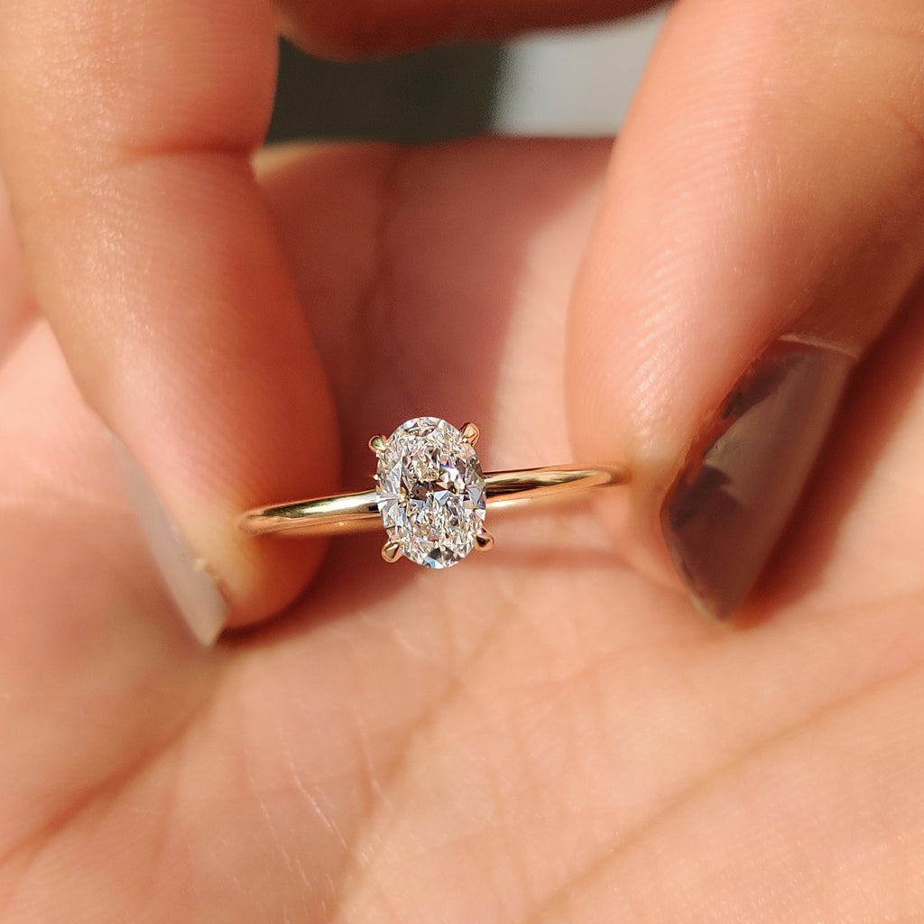 Oval Shaped Diamond Engagement Ring in Solitaire Setting