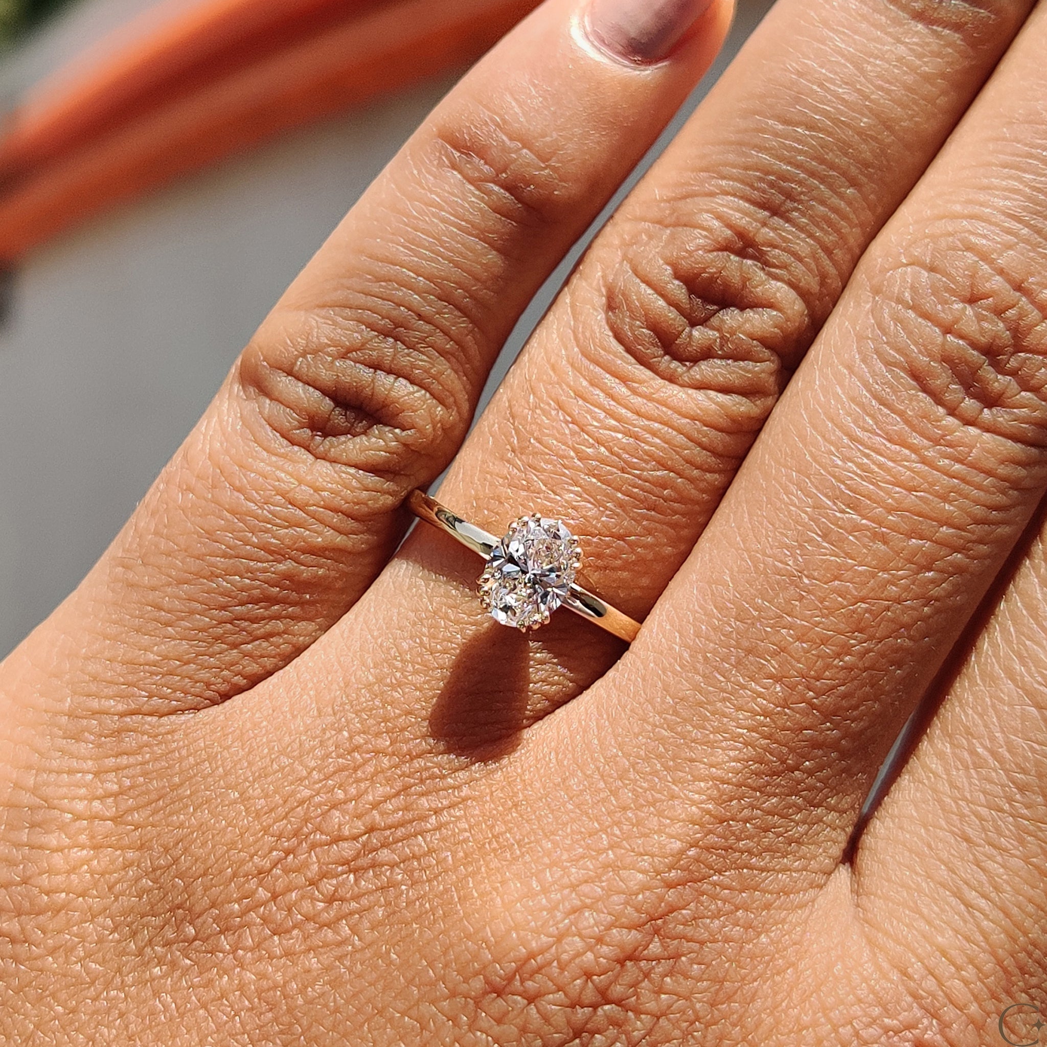 Oval Shaped Diamond Ring In Solitaire Setting