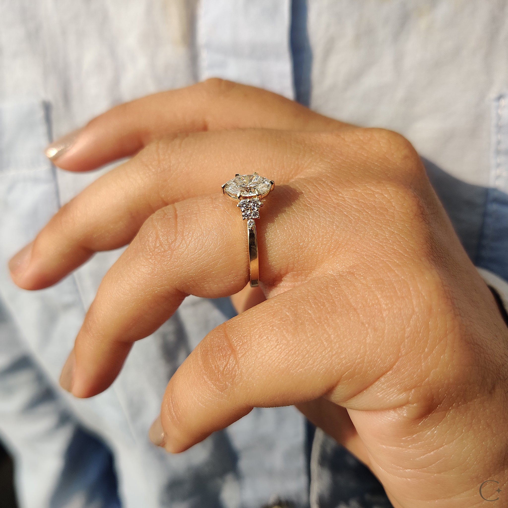 Oval Cut Engagement Ring In Cluster Setting