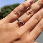 Round Side Stone With East West Marquise Ring