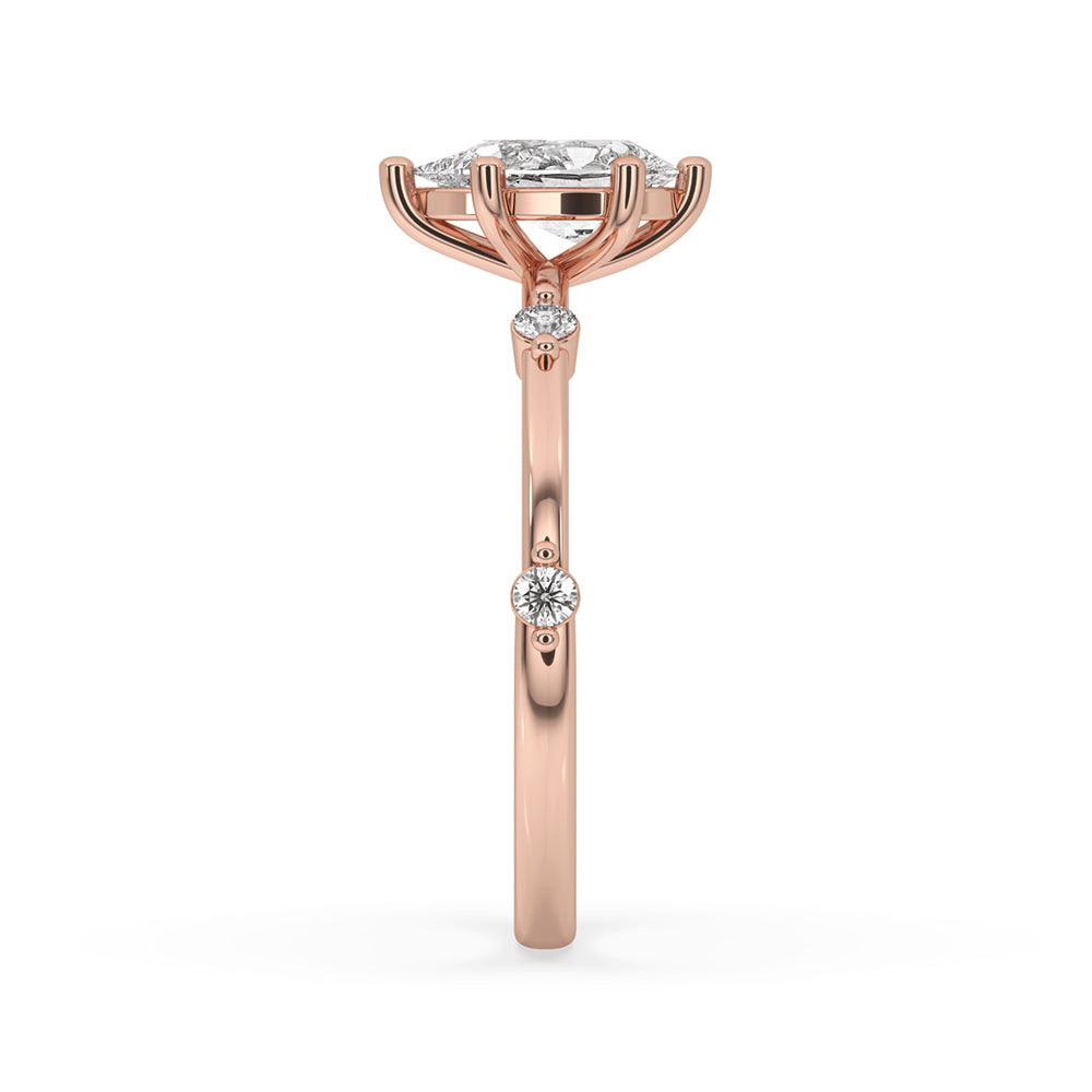 Pear Diamond Ring With Side Round Diamonds