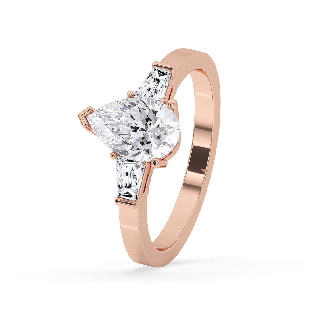 Pear and Baguette Cut Three Stone Engagement Ring