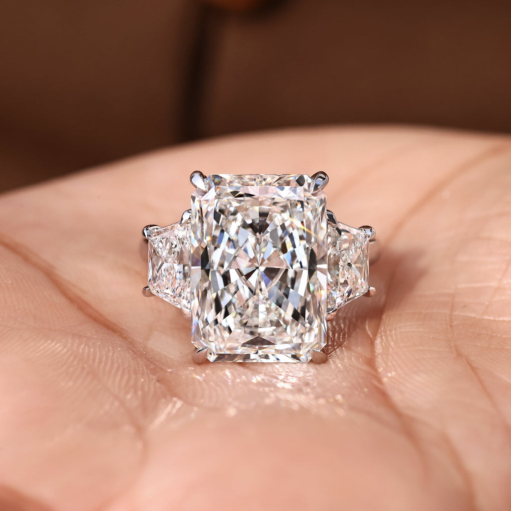 10 - 14 Carat Radiant Cut Diamond Ring with Trapezoid Side Stones