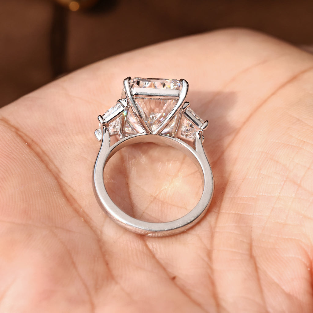 10 - 14 Carat Radiant Cut Diamond Ring with Trapezoid Side Stones