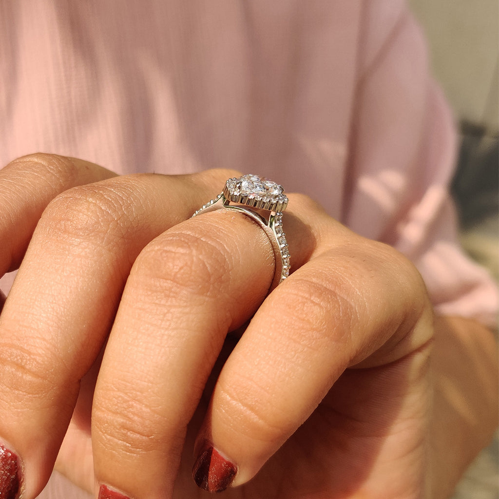 Pear Shaped Halo Engagement Ring In Round Cut Halo Style