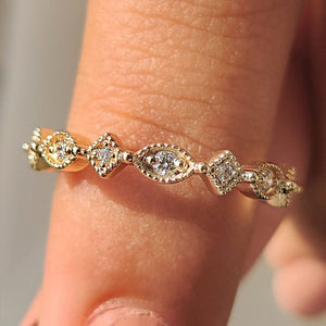 Round Cut Yellow Gold Diamond Wedding Band With Marquise Outline