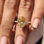 Yellow Oval Moissanite engagement ring in pave set