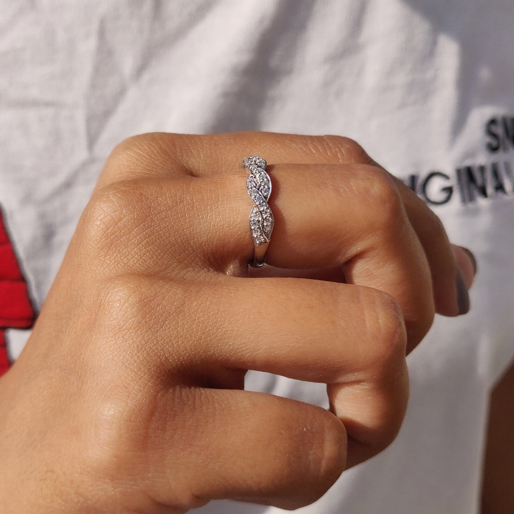 Twisted Eternity Band In Round Cut Moissanite