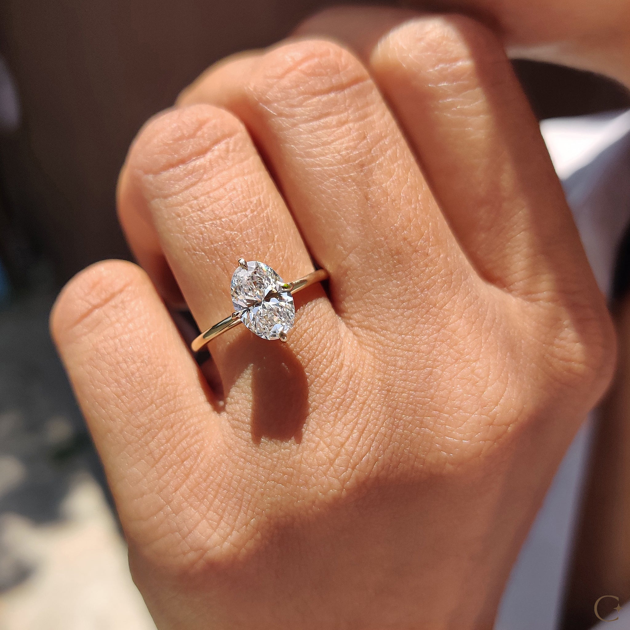 Oval Solitaire Diamond Ring With Compass Prong