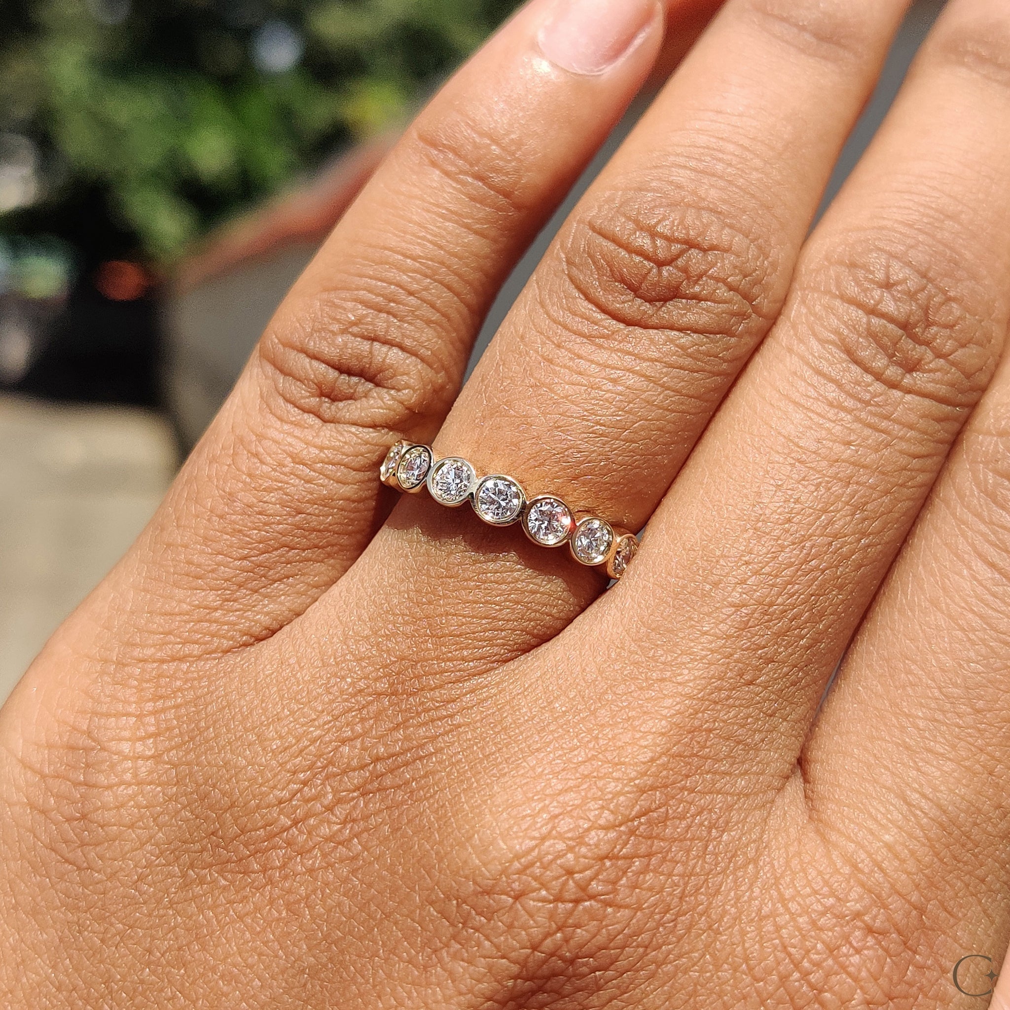 Bezel Set Wedding Band Featuring Round Diamond