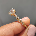 Round Cut Moissanite Engagement Ring Featuring Twisted Pave Set