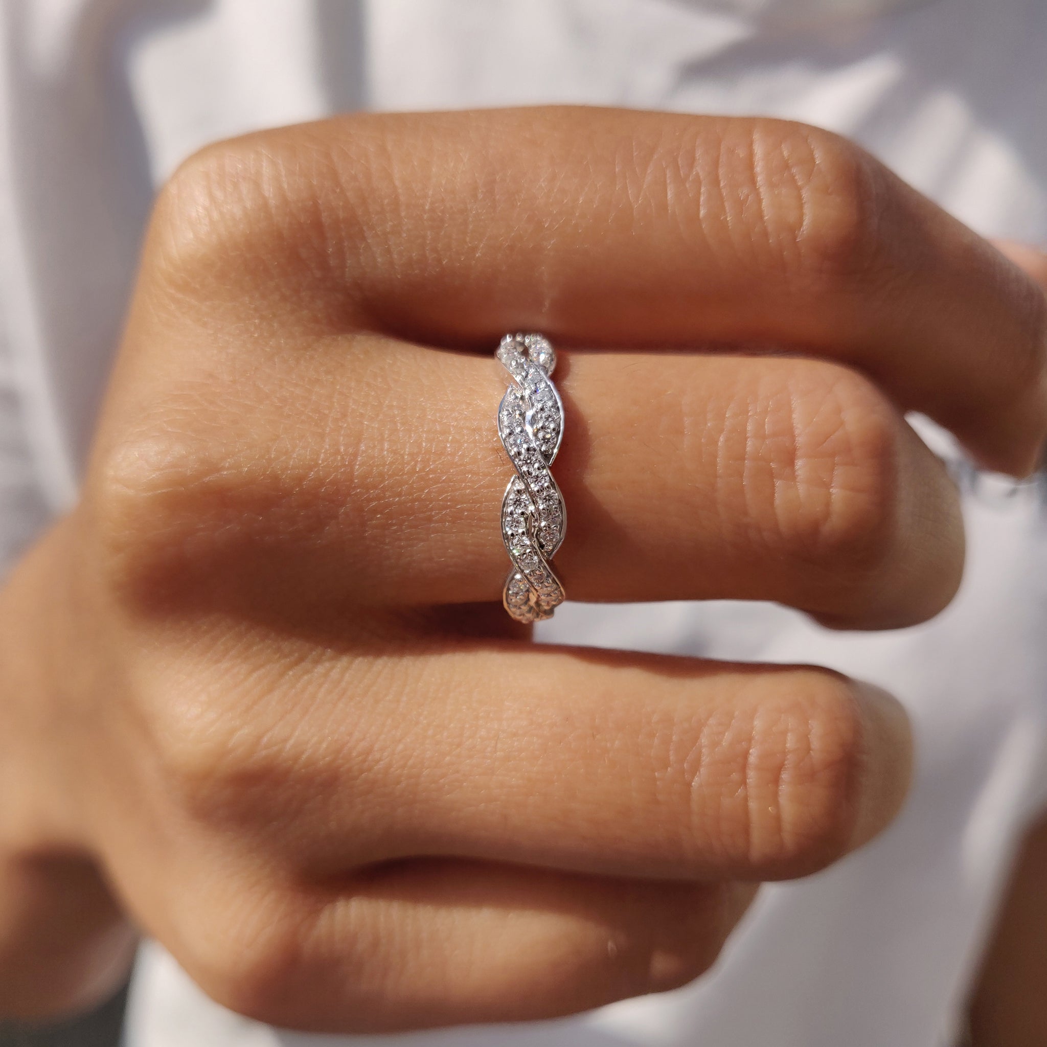 Twisted Eternity Band In Round Cut Moissanite