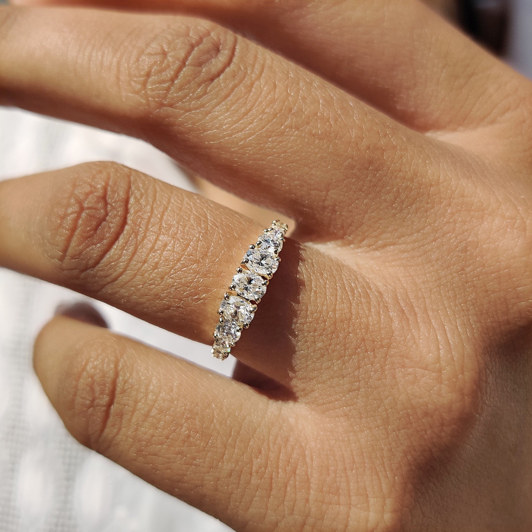 Half Eternity Oval Cut Diamond Band