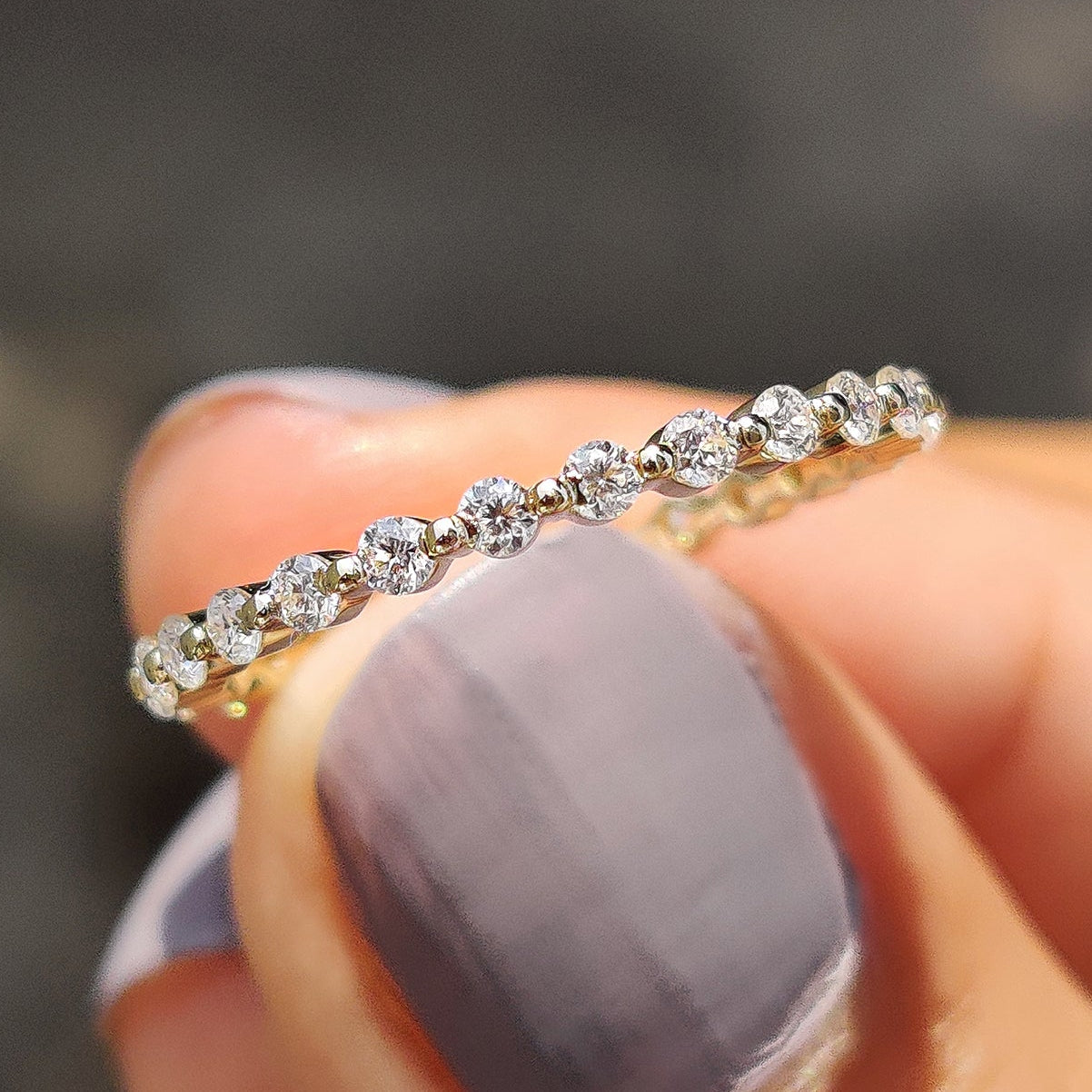 Yellow Gold Eternity Band In Round Cut Moissanite