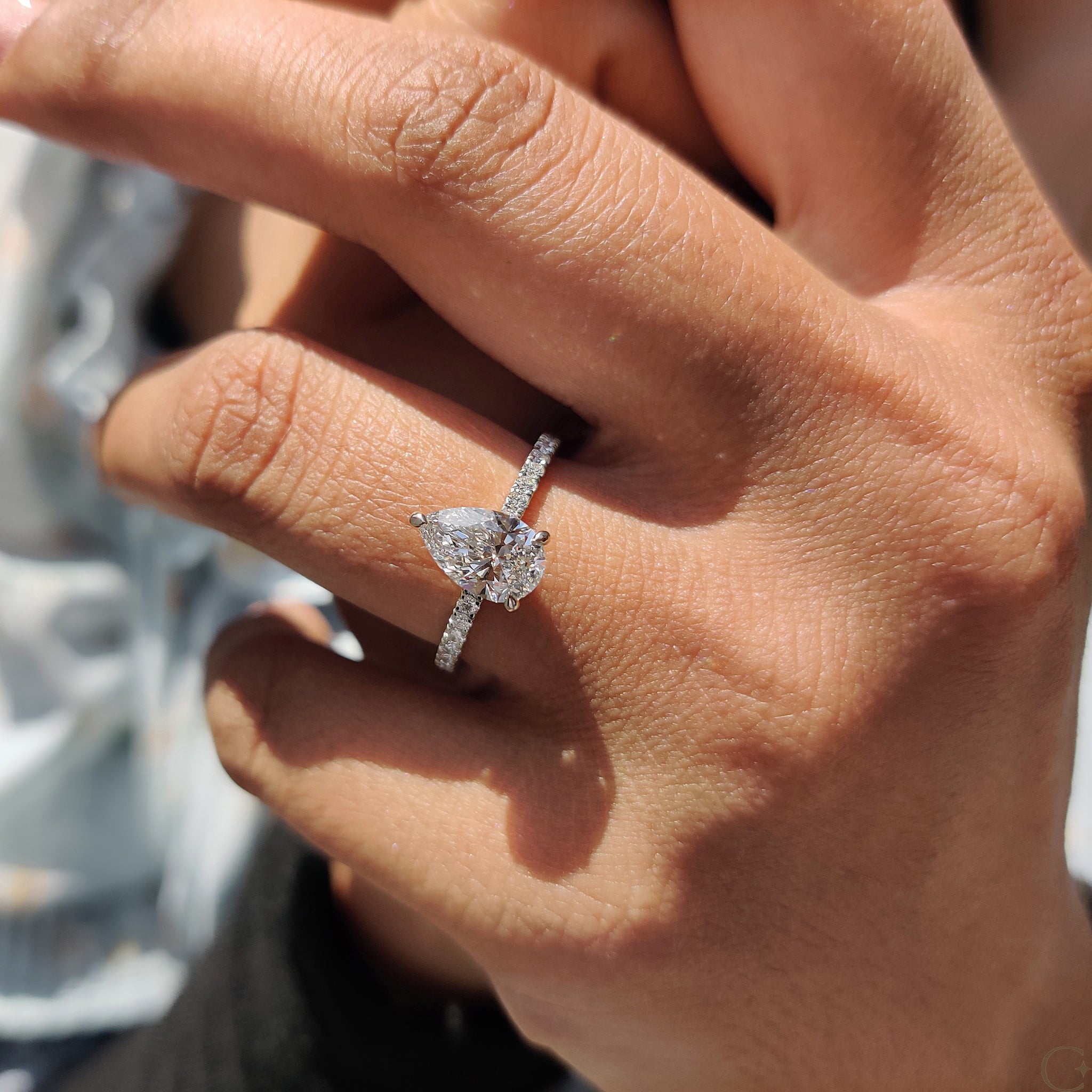Pear Cut Engagement Ring With Hidden Halo Design Secondary image