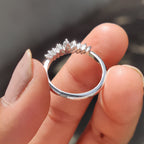 Curved Wedding Band With Marquise And Baguette Stone