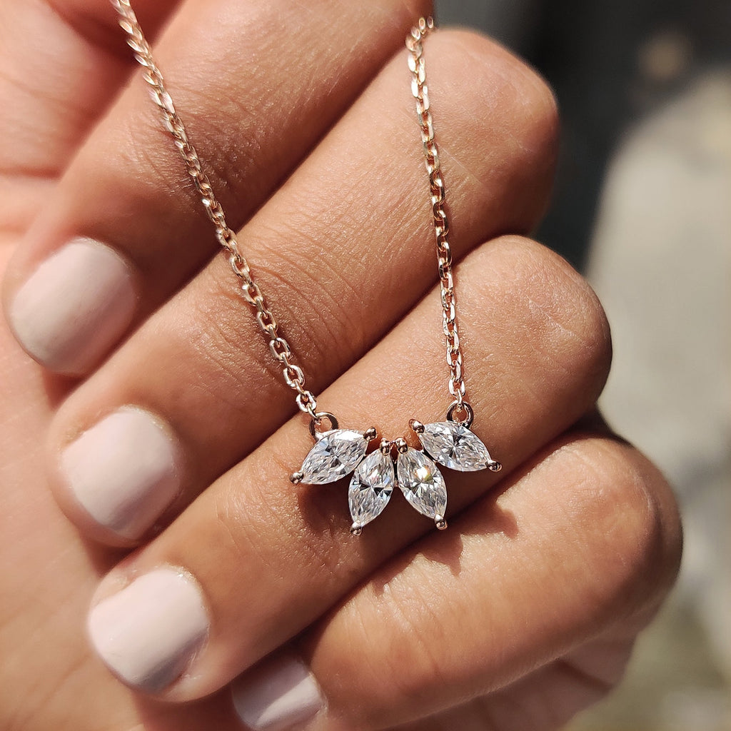Arc Marquise Moissanite Pendant In Four Stone Design