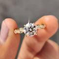 Round Cut Moissanite Engagement Ring Featuring Twisted Pave Set