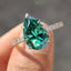 Green Moissanite Pear Ring With Pave Band