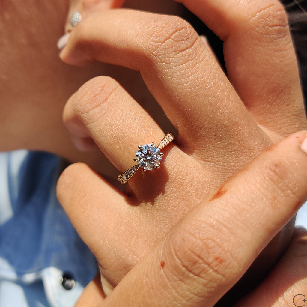 Round Cut Engagement Ring with Tapered Pave Setting