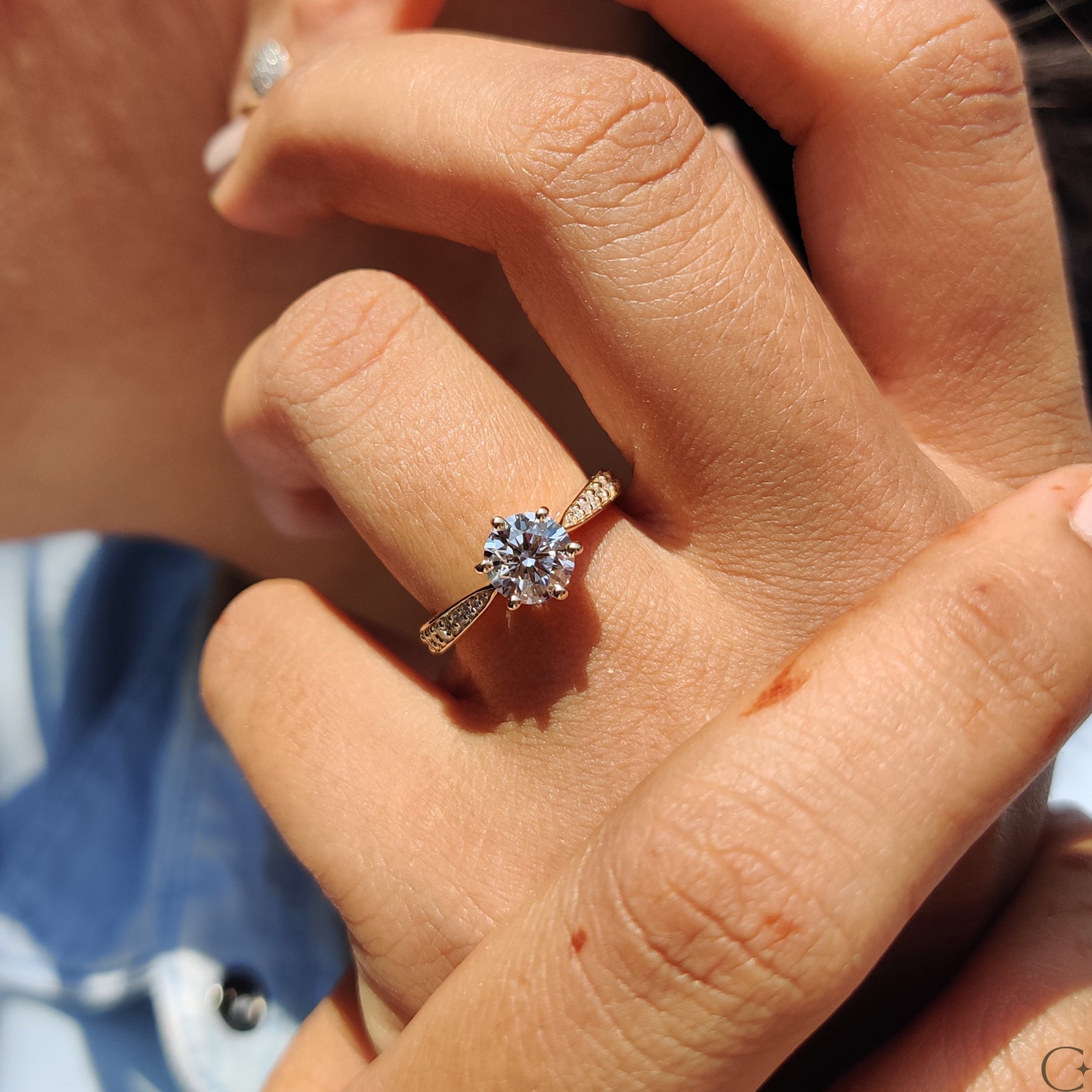 Round Cut Engagement Ring with Tapered Pave Setting