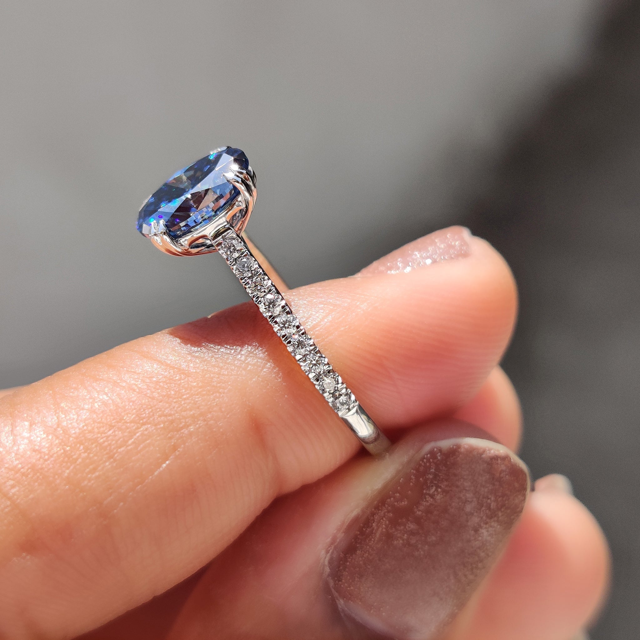 Royal Dark Blue Oval Cut Cathedral Setting Ring