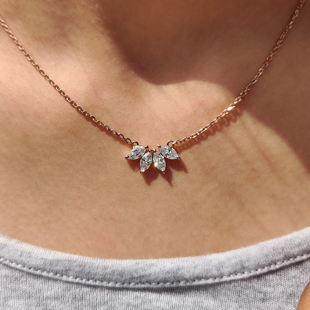 Arc Marquise Moissanite Pendant In Four Stone Design