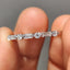 Shared Prong Eternity Band With Round And Baguette Moissanite