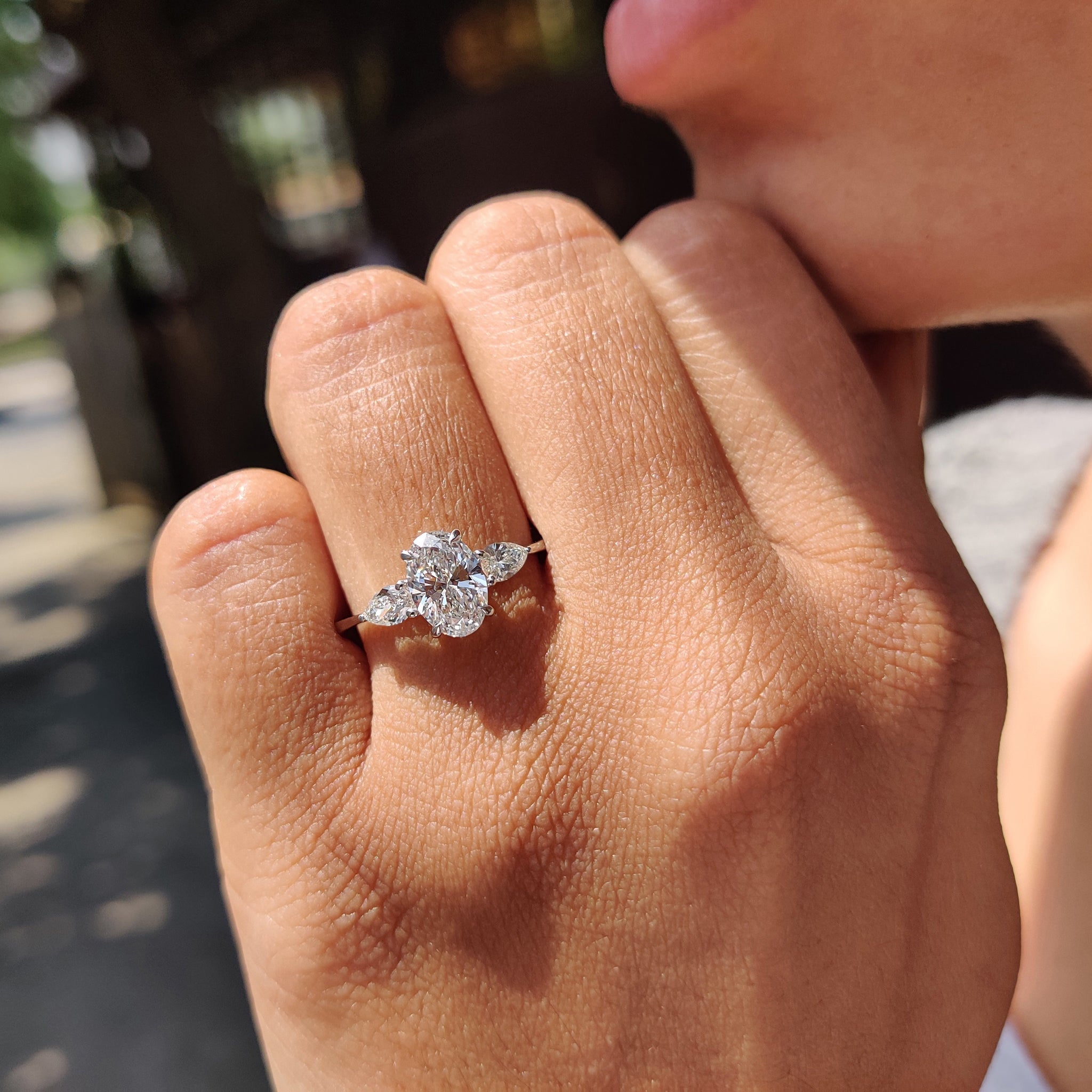 3 Stone Diamond Ring With Oval And Pear Cut