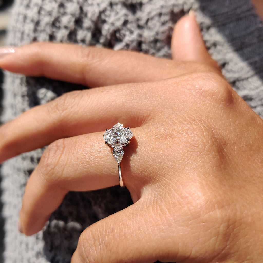 3 Stone Diamond Ring With Oval And Pear Cut