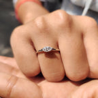 Round Side Stone With East West Marquise Ring
