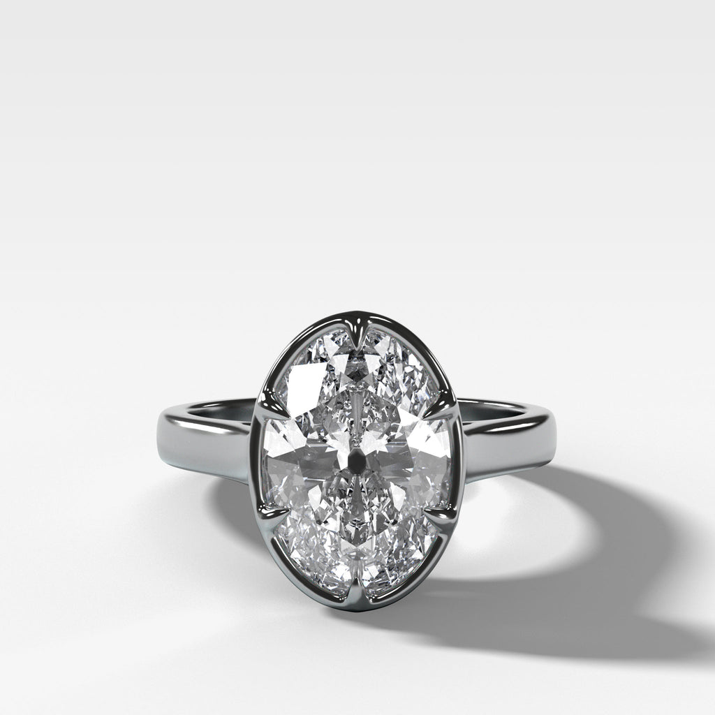Six Prong Bezel Set Engagement Ring With Antique Oval Cut