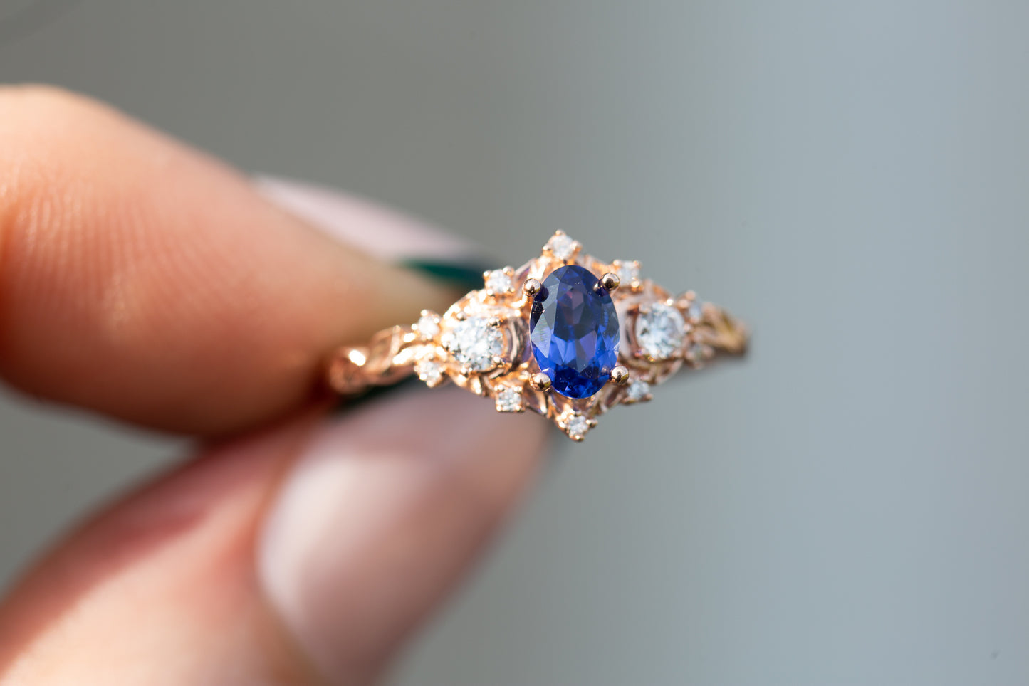 oval cut crescent moon with oval blue sapphire engagement rings