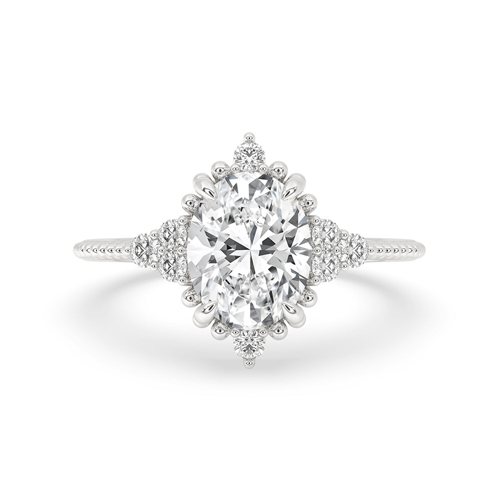 Oval Diamond Ring With Round Side Stone Main image