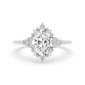 Oval Diamond Ring With Round Side Stone