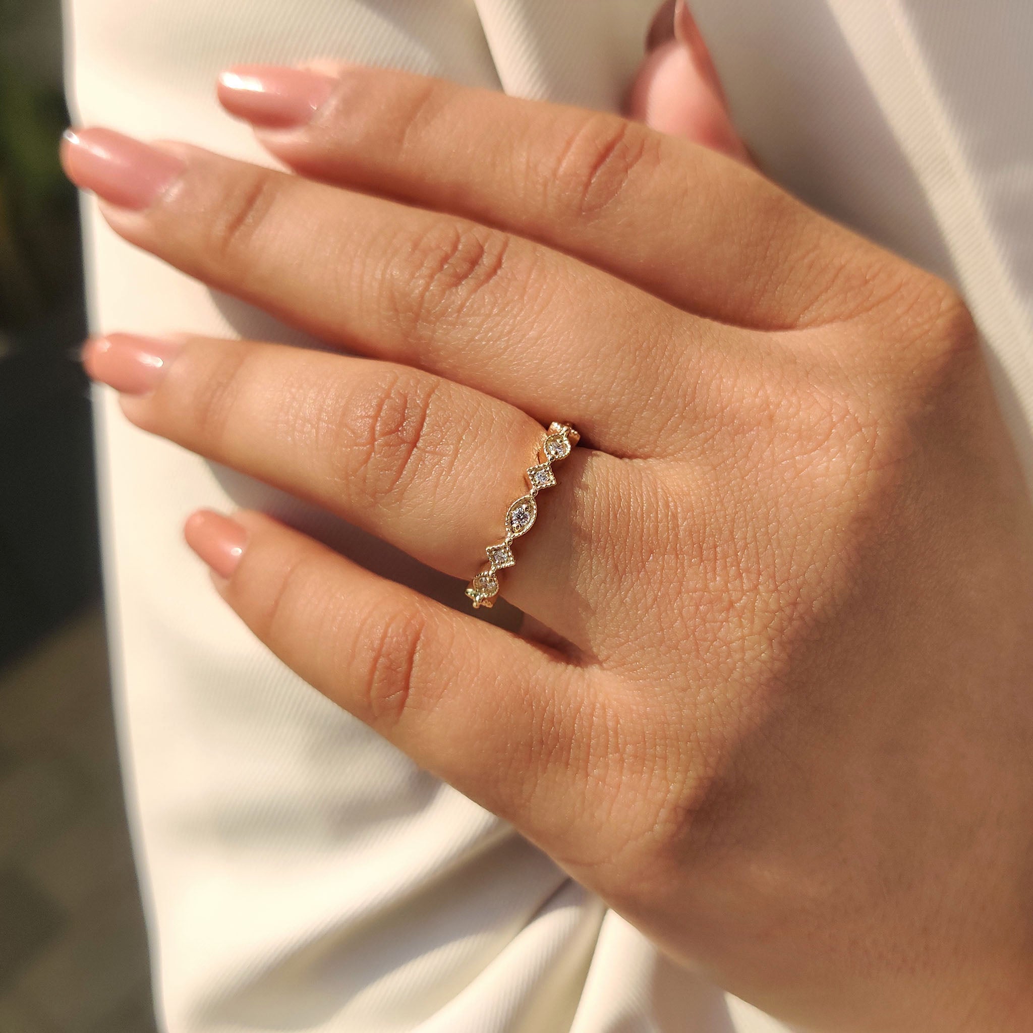 Round Cut Yellow Gold Diamond Wedding Band With Marquise Outline