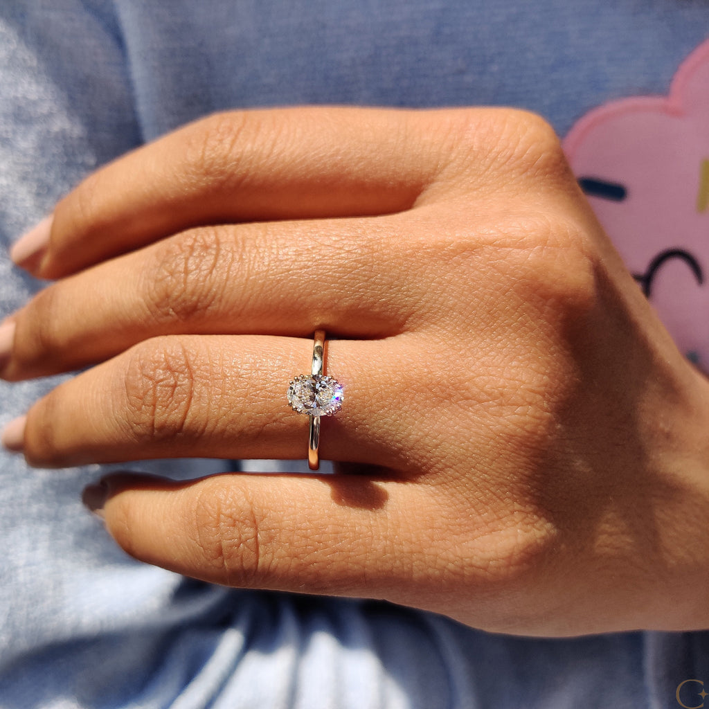 Oval Shaped Diamond Ring In Solitaire Setting