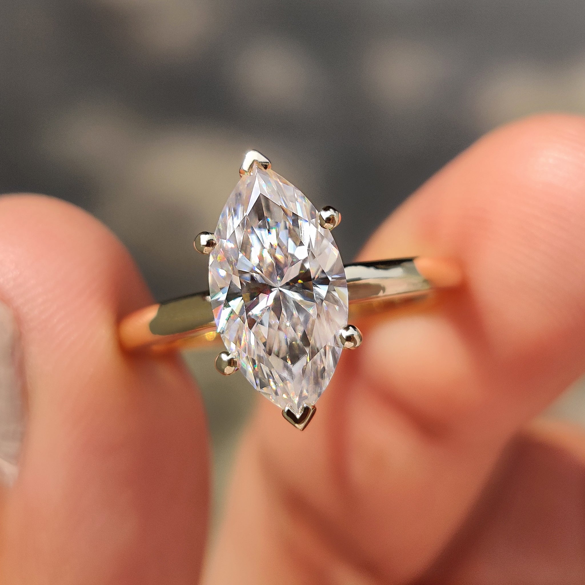 Marquise Cut Solitaire Ring With Hidden Halo Design